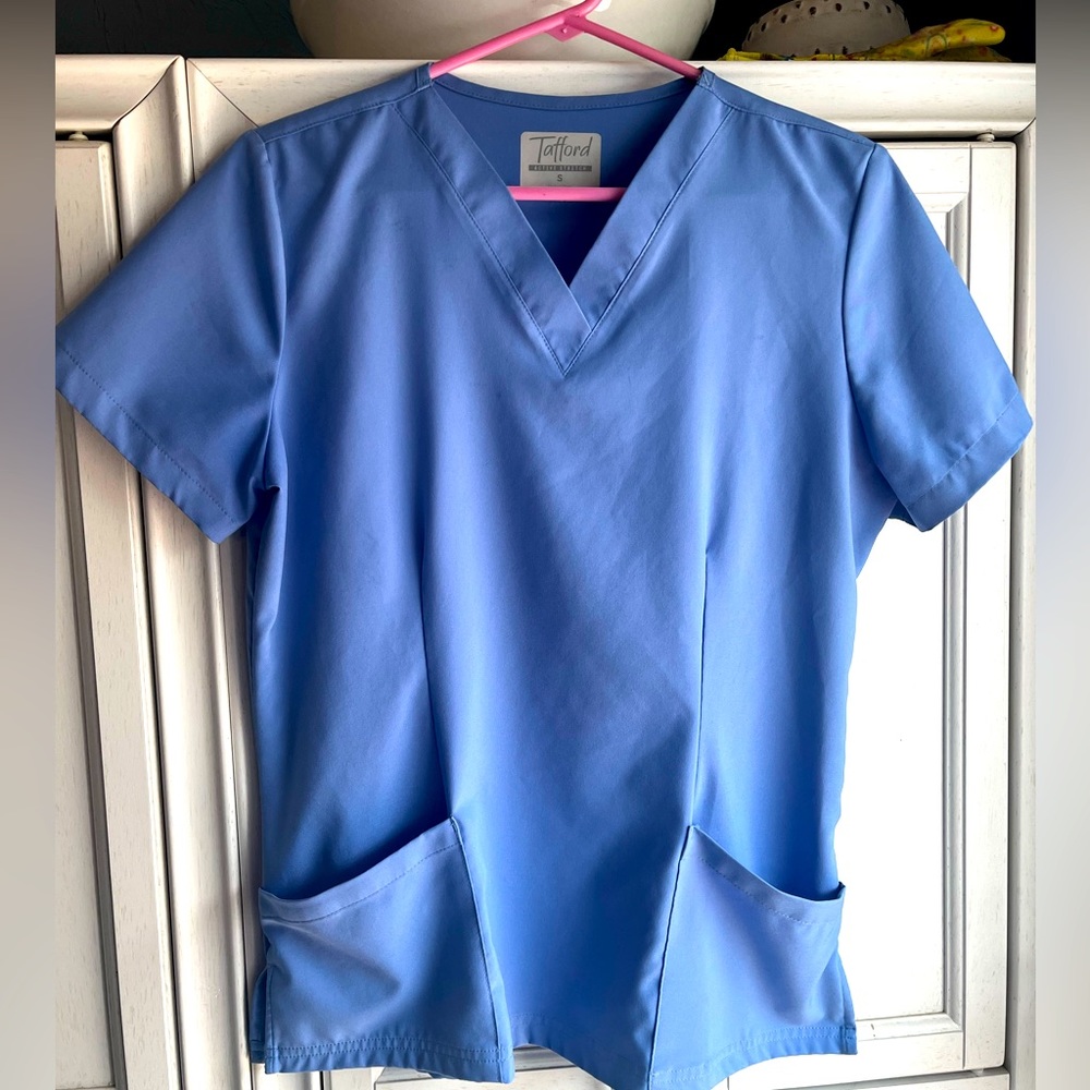 Ceil blue scrub top. Size S. Worn one time